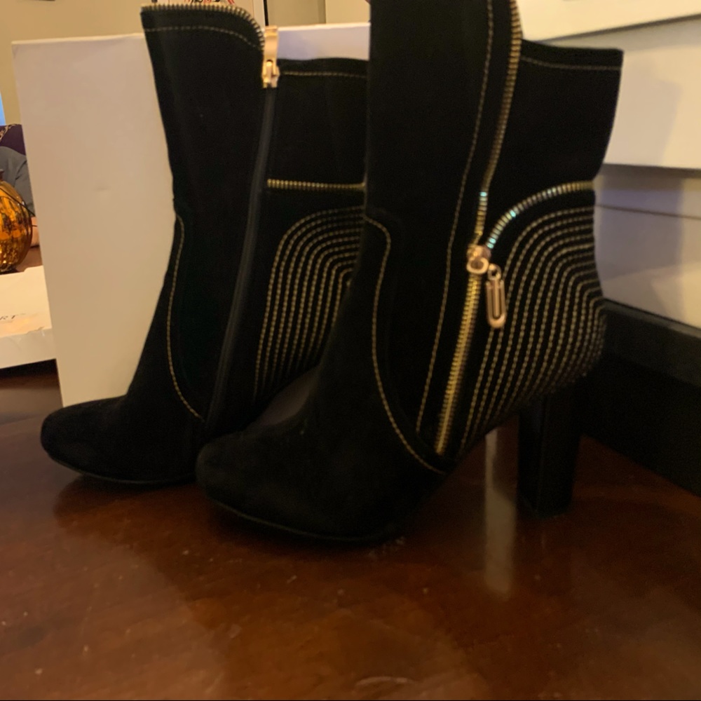 Black and gold boots